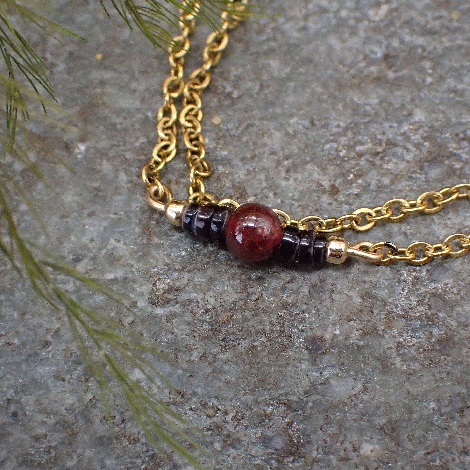 choker ketting goud paarse steen