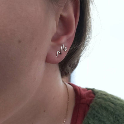 zilveren oorklimmer van voor af organische vorm